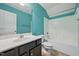 Bright bathroom featuring a single vanity, toilet, and tub-shower combination at 33 Bluestone Dr, Smithfield, NC 27577