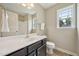 Neutral bathroom with a large vanity and a window at 33 Bluestone Dr, Smithfield, NC 27577
