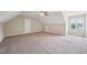 Spacious room with plush carpet, a fan above, and bright lighting at 33 Bluestone Dr, Smithfield, NC 27577