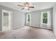 Bedroom featuring plush carpet, gray walls, and a fan above at 33 Bluestone Dr, Smithfield, NC 27577