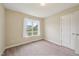 Bedroom featuring neutral carpet, and a bright window at 33 Bluestone Dr, Smithfield, NC 27577