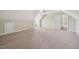Spacious room with plush carpet, a fan above, and bright lighting at 33 Bluestone Dr, Smithfield, NC 27577