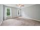 Bedroom featuring plush carpet, gray walls, and a fan above at 33 Bluestone Dr, Smithfield, NC 27577