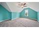 Bedroom featuring plush carpet, teal walls, and a fan above at 33 Bluestone Dr, Smithfield, NC 27577