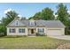 Charming single-Gathering home featuring a two-car garage and well-manicured lawn at 33 Bluestone Dr, Smithfield, NC 27577