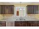 Bright kitchen featuring stainless steel appliances, a tile backsplash, and granite counters, making cooking more enjoyable at 33 Bluestone Dr, Smithfield, NC 27577