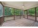 This home has a charming screened in back porch with wooden floors and railing, perfect for relaxing at 33 Bluestone Dr, Smithfield, NC 27577