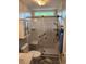 Beautiful bathroom featuring a tiled shower with glass doors and built in bench at 3409 Bennyfield Ct, Fuquay Varina, NC 27526