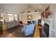 Spacious living room features a fireplace, hardwood floors, and ample natural light at 3409 Bennyfield Ct, Fuquay Varina, NC 27526