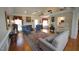 Elegant living room with hardwood floors, fireplace, and comfortable seating arrangement at 3409 Bennyfield Ct, Fuquay Varina, NC 27526