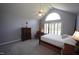 Comfortable main bedroom features a vaulted ceiling, ceiling fan, and ample closet space at 3409 Bennyfield Ct, Fuquay Varina, NC 27526