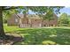 Large backyard showcasing the lush, green lawn and the expansive property surrounding the home at 3537 Sweetgum Rd, Gibsonville, NC 27249
