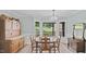 Charming dining room with natural light, classic furnishings, and a view of the outdoors at 3537 Sweetgum Rd, Gibsonville, NC 27249