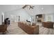 Spacious living room with high ceilings, a stone fireplace, hardwood floors, and comfortable seating at 3537 Sweetgum Rd, Gibsonville, NC 27249