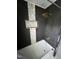 Modern shower with gold rainfall shower head, dark tile walls, and convenient built-in shelving at 3537 Sweetgum Rd, Gibsonville, NC 27249