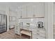 Stylish kitchen with custom cabinetry, stainless steel appliances, and a built-in coffee bar area at 3613 Cross Timber Ln, Raleigh, NC 27603