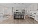 Well-appointed kitchen with stainless steel appliances, granite countertops, and island seating under pendant lights at 3613 Cross Timber Ln, Raleigh, NC 27603