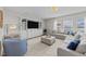 Comfortable living room featuring a built-in entertainment center and plush sectional seating at 3613 Cross Timber Ln, Raleigh, NC 27603