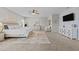 This main bedroom provides a decorative wall, ceiling fan, ensuite, and large carpet rug at 3613 Cross Timber Ln, Raleigh, NC 27603