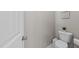 A simple powder room includes a toilet and a bright neutral wall at 3613 Cross Timber Ln, Raleigh, NC 27603