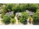 Aerial view of the home nestled amongst mature trees in a desirable neighborhood at 3720 Bridgeton Park Dr, Raleigh, NC 27612