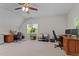 Expansive home office featuring two work areas with modern equipment and comfortable seating at 3720 Bridgeton Park Dr, Raleigh, NC 27612