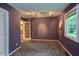 This bedroom offers ample space and natural light from the large window at 3833 Hidden Branches Dr, Raleigh, NC 27613