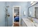 Charming bathroom with glass shower visible through a doorway at 414 W Markham Ave, Durham, NC 27701