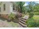Charming home exterior with stone steps and lush landscaping at 414 W Markham Ave, Durham, NC 27701
