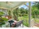 Inviting front porch with a swing, chairs, and a view of the landscaped front yard at 414 W Markham Ave, Durham, NC 27701
