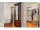 Hallway with view to walk-in closet and exterior doors at 414 W Markham Ave, Durham, NC 27701