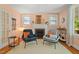 Cozy living room with a fireplace, hardwood floors, and comfortable seating area at 414 W Markham Ave, Durham, NC 27701
