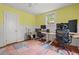 Functional office featuring hardwood floors and natural light at 414 W Markham Ave, Durham, NC 27701