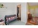 Inviting screened-in porch with comfortable furniture and access to the interior at 414 W Markham Ave, Durham, NC 27701