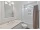 Bathroom with marble countertops, and a shower/bathtub combination with white subway tile at 414 Wyndham Dr, Chapel Hill, NC 27516