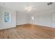Main bedroom with hardwood floors, ceiling fan, natural light, and an en-suite bathroom at 414 Wyndham Dr, Chapel Hill, NC 27516