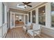 Inviting screened-in porch with views to the inside kitchen and dining area and also overlooks the backyard at 414 Wyndham Dr, Chapel Hill, NC 27516
