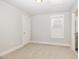 Bedroom boasts neutral carpet and an abundance of natural light through window at 442 Granite Mill Blvd, Chapel Hill, NC 27516