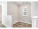 Cozy room with hardwood floors, neutral paint, white trim and a window at 442 Granite Mill Blvd, Chapel Hill, NC 27516