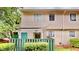 Charming townhome with a private front entrance and lush landscaping creating curb appeal at 4736 Walden Pond Dr, Raleigh, NC 27604