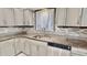 Well-equipped kitchen with ample cabinet space and a stylish backsplash, perfect for cooking at 4736 Walden Pond Dr, Raleigh, NC 27604
