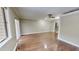Spacious living room featuring hardwood floors and sliding glass doors to the outside at 4736 Walden Pond Dr, Raleigh, NC 27604