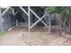Outdoor patio featuring a gravel and stained concrete yard, a gray privacy fence and some landscaping at 4736 Walden Pond Dr, Raleigh, NC 27604