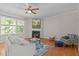 Cozy living room with hardwood floors, fireplace, and a comfortable seating arrangement at 4804 Carmen Ln, Durham, NC 27707