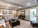 Comfortable living area with a sofa and stylish decor, perfect for relaxation at 5005 Lenoraway Dr, Raleigh, NC 27613