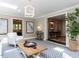 Sunlit living room with a view of the landscape, creating a serene atmosphere at 5005 Lenoraway Dr, Raleigh, NC 27613