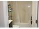 Clean bathroom featuring a shower-tub combination and neutral finishes at 503 N Franklin Dr, Sanford, NC 27330