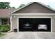 Spacious two-car garage with ample storage space and parking for multiple vehicles at 503 N Franklin Dr, Sanford, NC 27330