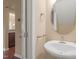 Powder room featuring a pedestal sink and neutral wall color at 507 Brier Crossings Loop, Durham, NC 27703