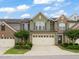 Charming townhome with a two-car garage, beautiful landscaping, and inviting curb appeal at 507 Brier Crossings Loop, Durham, NC 27703